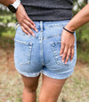 Madi Cuffed Raw Hem Medium Denim Shorts